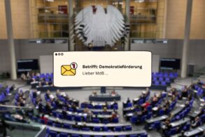 Das Bild zeigt im Hintergrund den deutschen Bundestag und davor eine Benachrichtigung über eine ungelesene E-Mail zum Demokratieförderungsgesetz.